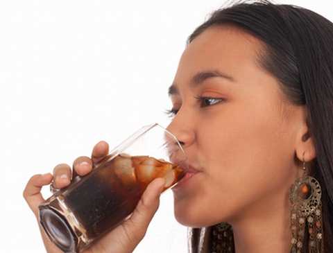 Woman drinking diet soda